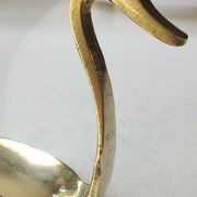 Pair of hand candle holders/Cellar rats shape swans, in polished brass. 1950s