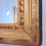 Miroir ancien en bois et stuc doré