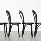 Ensemble de 4 chaises de bistrot noires de style Thonet vintage