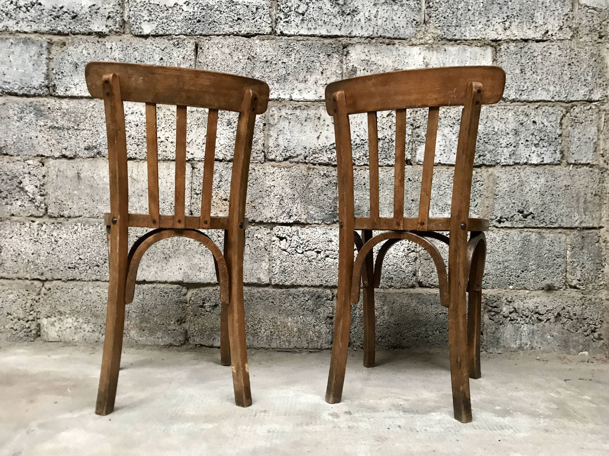 Pair of bistro chairs troquet Parisien in curved wood 1950