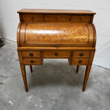 Cylinder desk with marquetry featuring a crosshatch design.