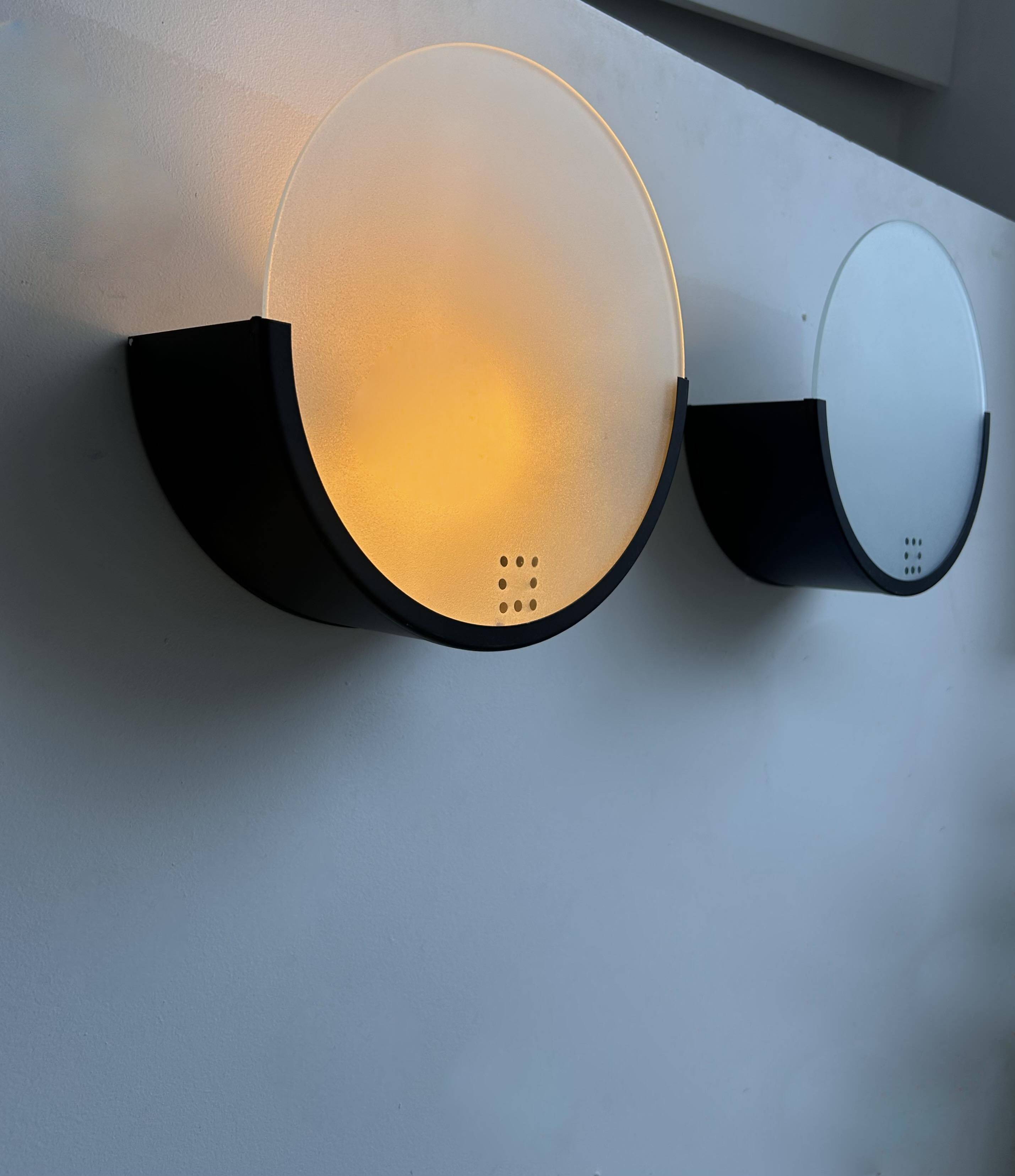 Pair of vintage geometric wall lights, black metal and sandblasted glass, Delmas France 1970