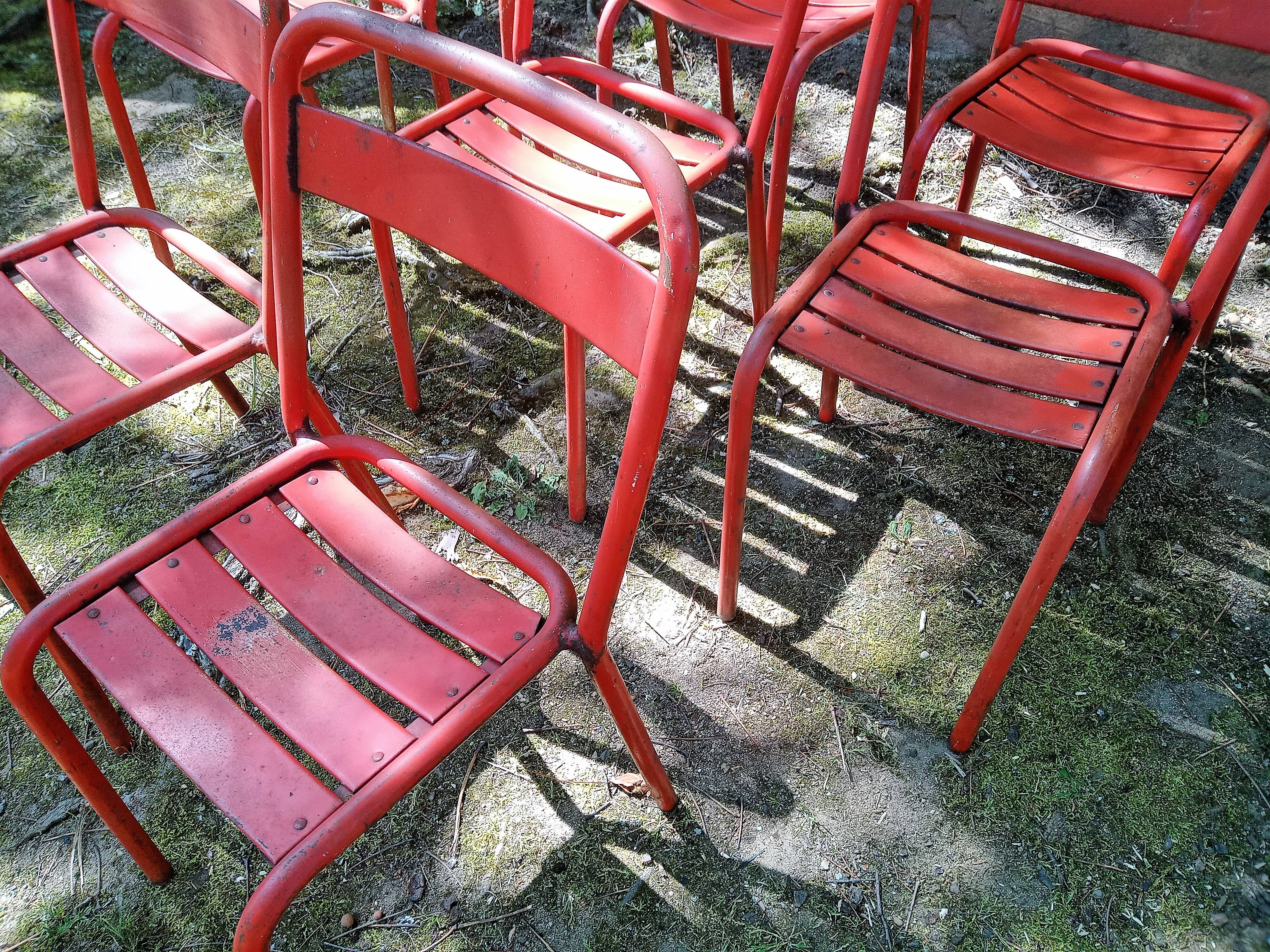Series of 8 red Tolix chairs