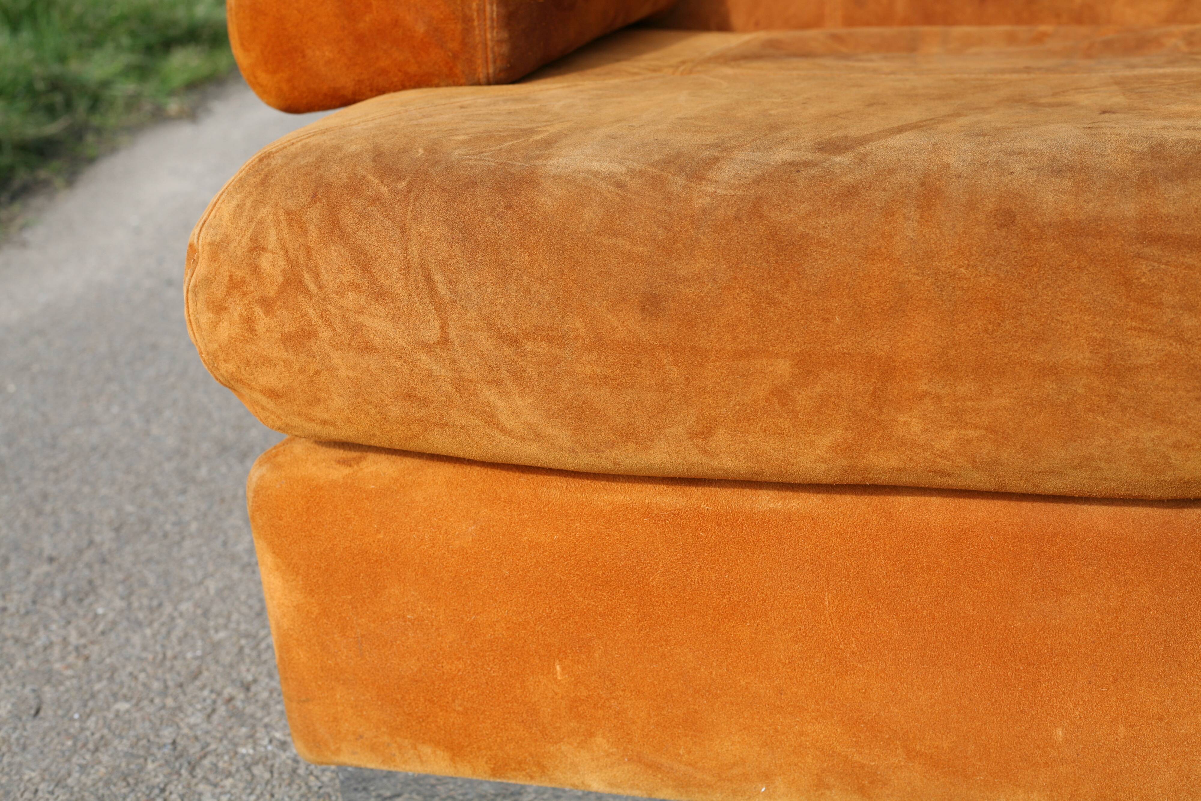Orange suede leather and steel sofa. Circa 1970