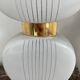 Pair of vintage wall lights from the 60s-70s in striped opaline glass and gilded brass.