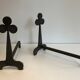 Pair of wrought steel and iron chenets with clover decorations 1950