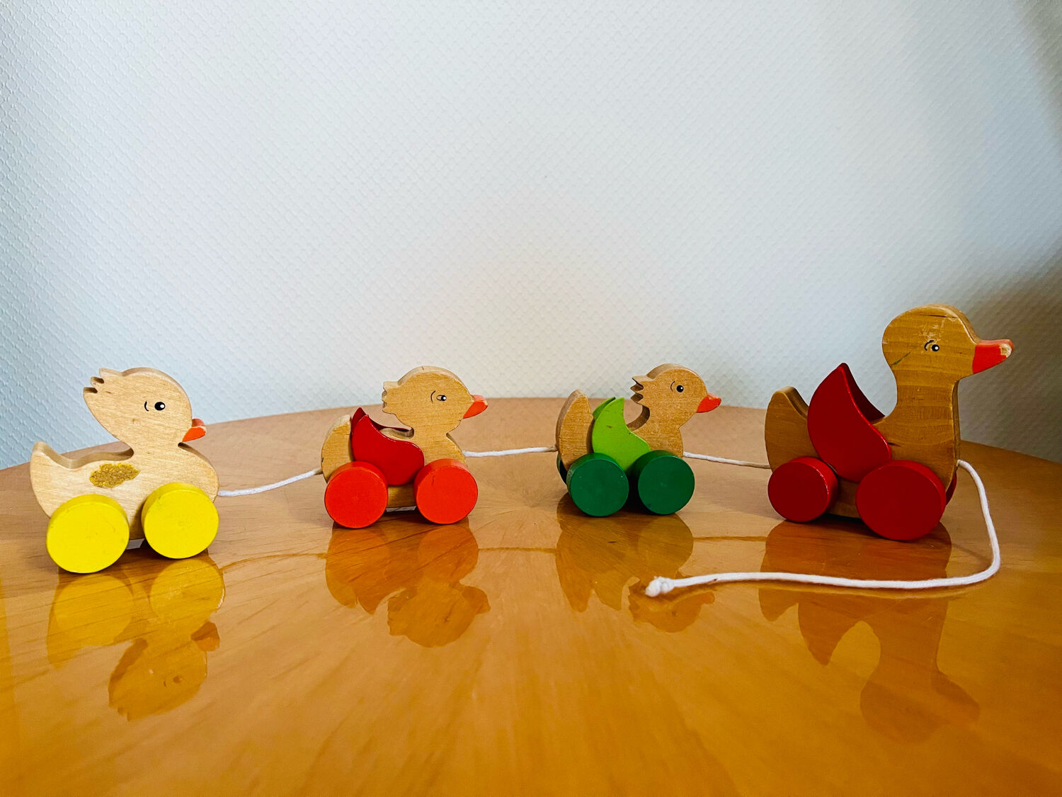 Old vintage wooden duck toy to pull