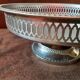 Old metal bowl on foot