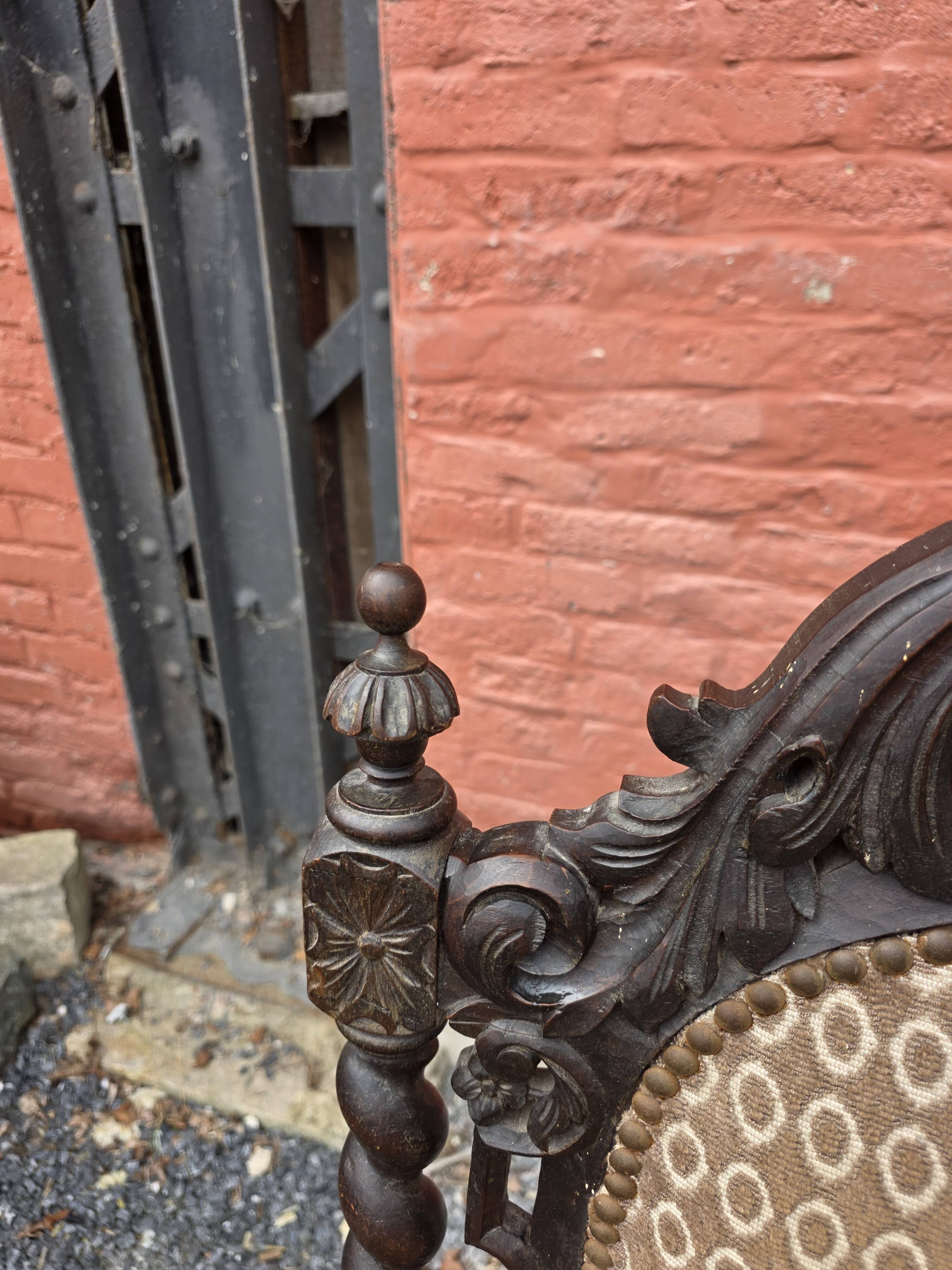 Three-seater armchair in Louis XIII style made of oak from the 19th century.