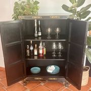 Magnificent black and gold lacquered Chinese cabinet.