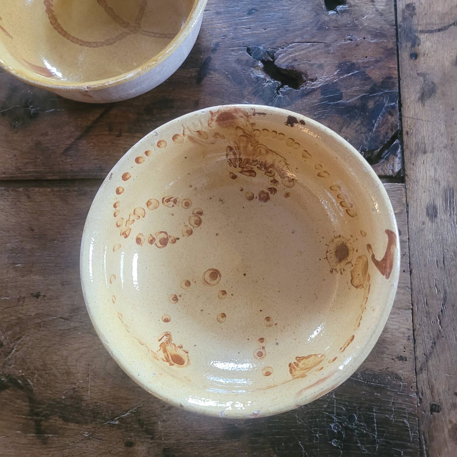 Two rustic glazed earthenware salad bowls, French craftsmanship, circa 1