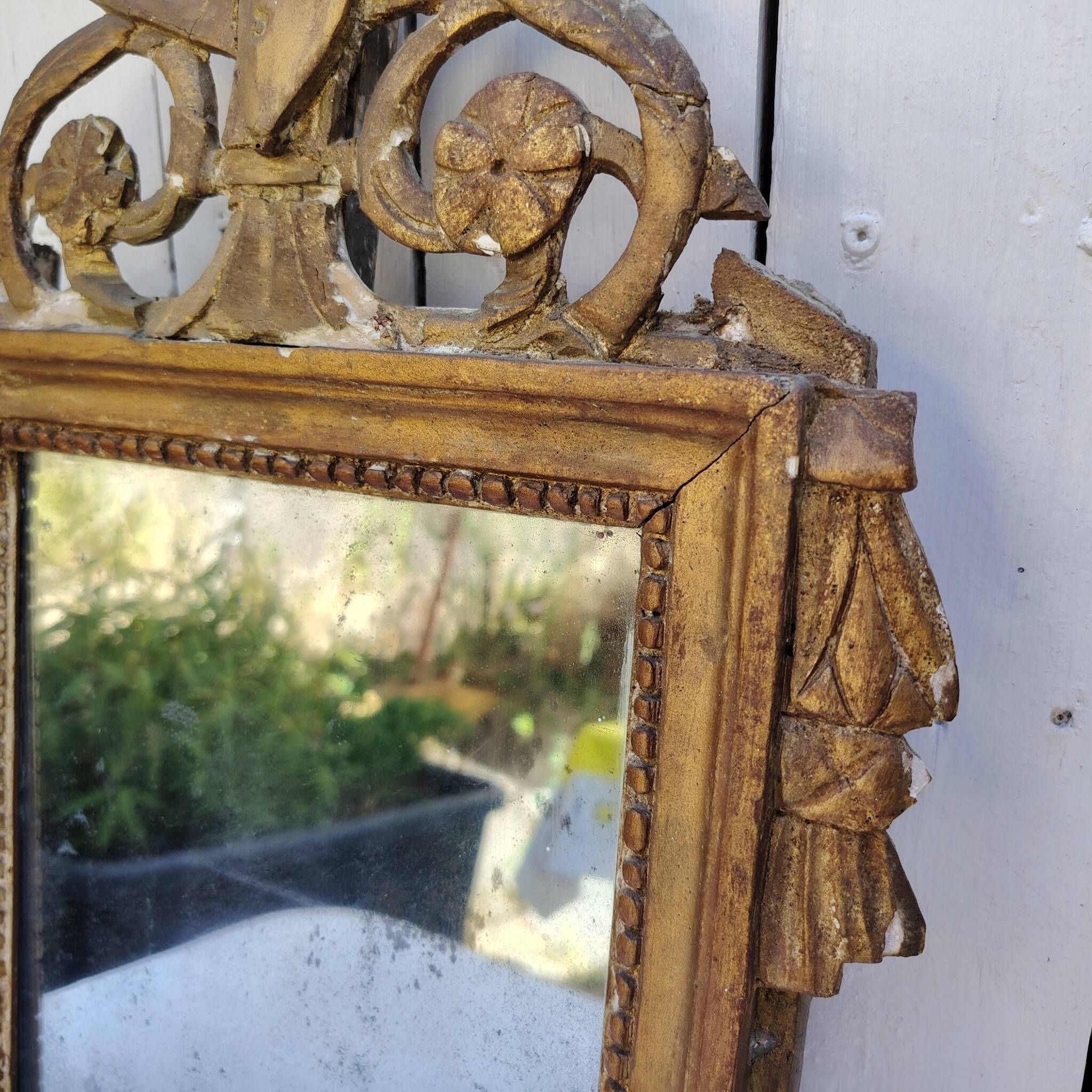 Miroir en bois doré et stuc, style Louis XVI, XIXème