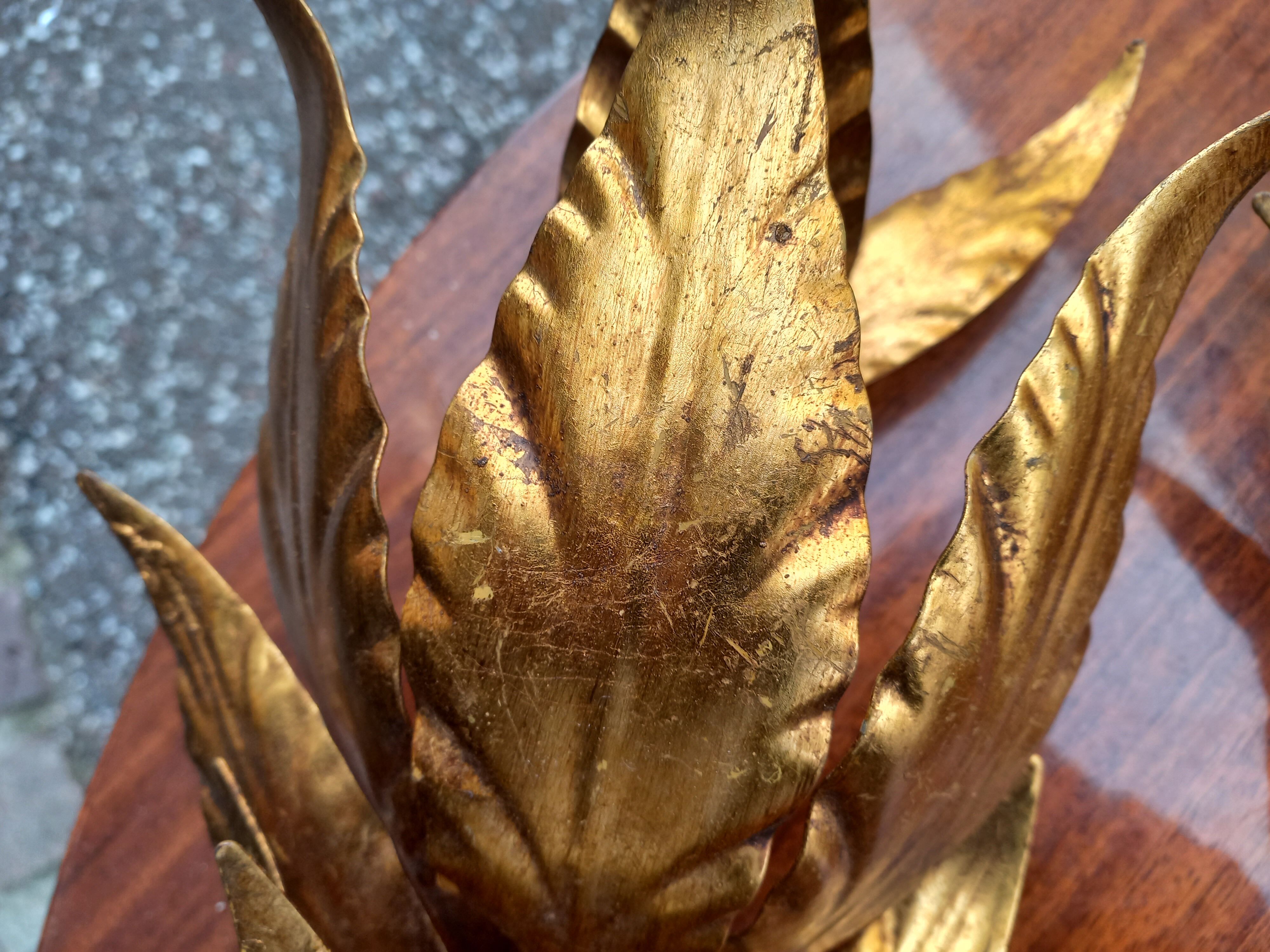 Pair of gold leaf sconces
