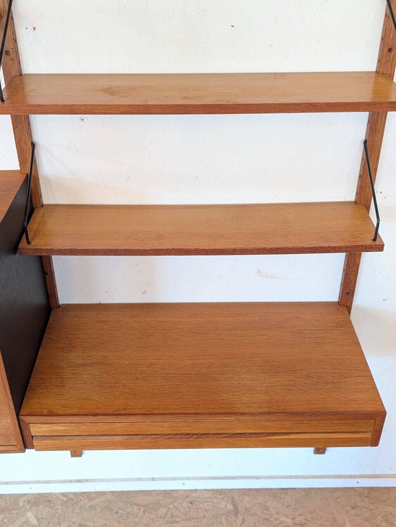 Teak wall unit by Poul Cadovius from the 1960s.