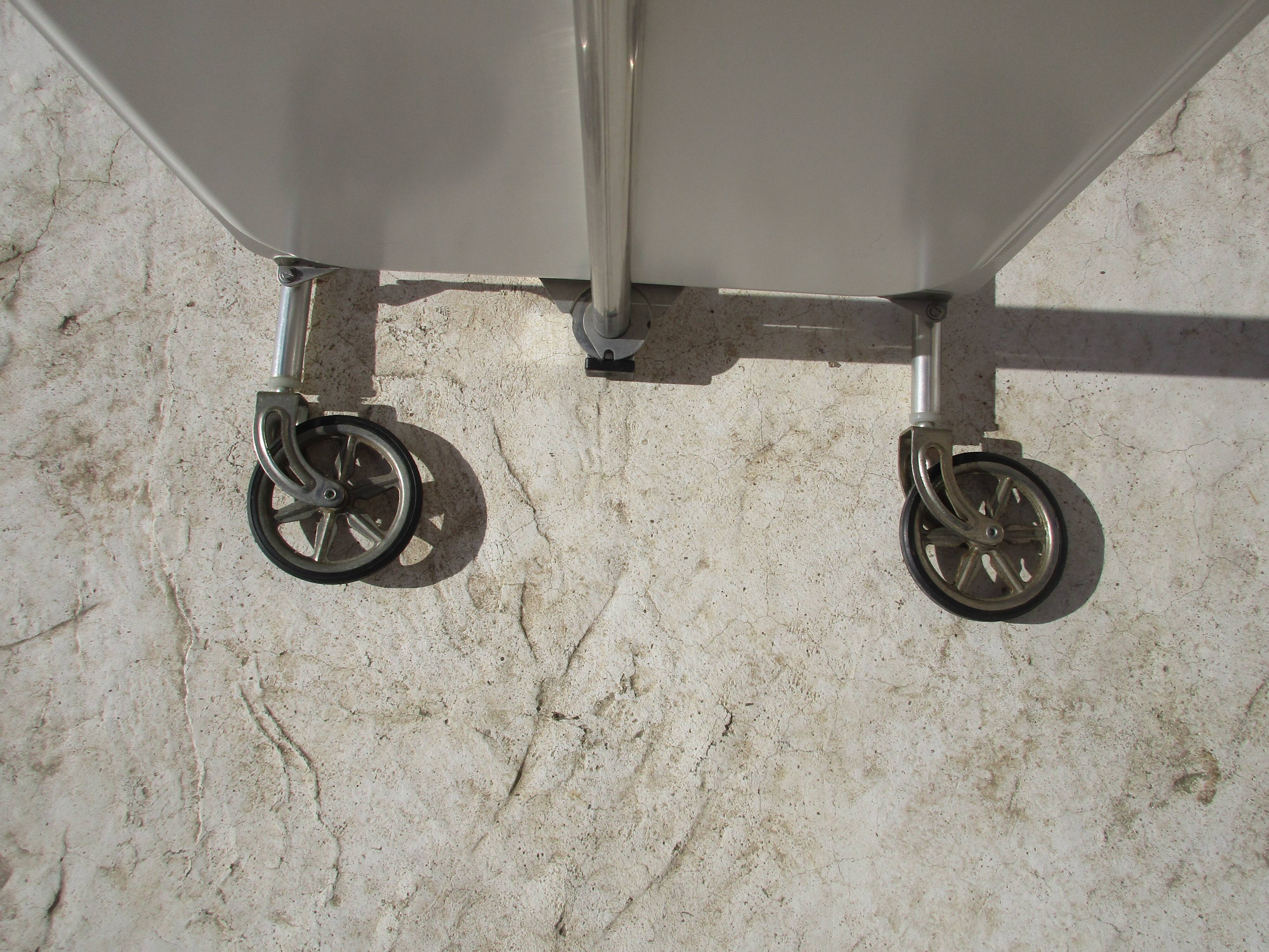 Roller folding extra table