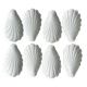 Set of white porcelain ramekins, ribbed shell shape.