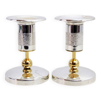 Pair of silver metal candlesticks