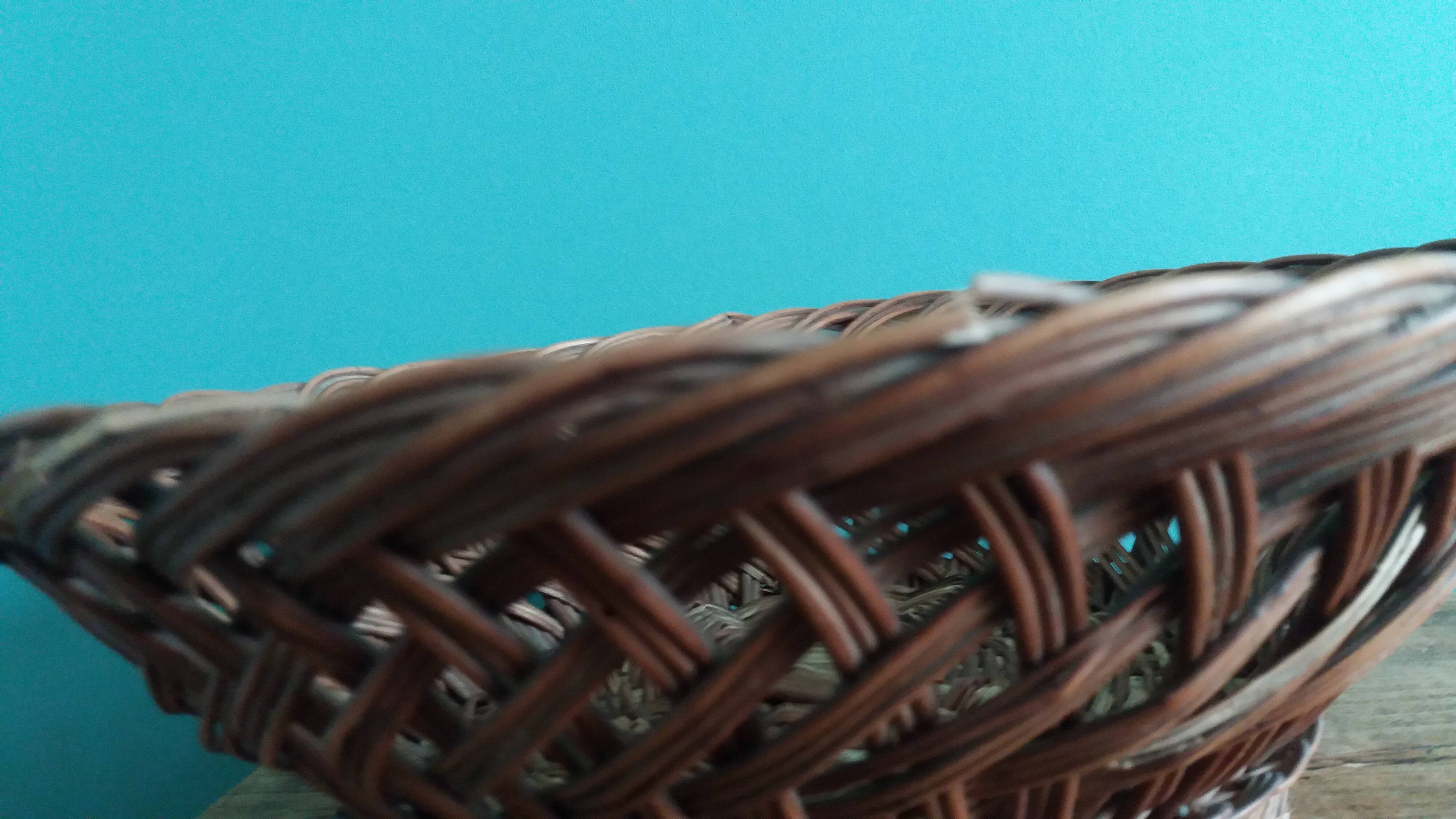 Antique basket, fruit basket or bread basket made of wicker