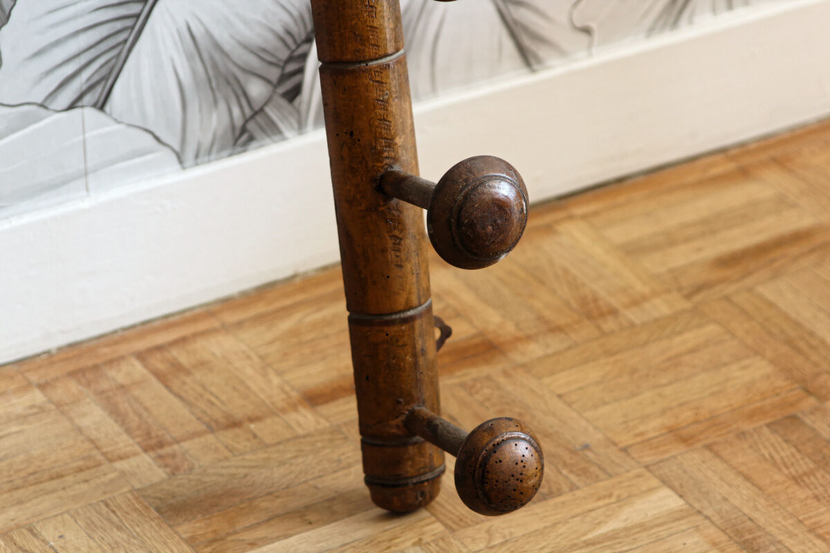 Wall mounted wooden coat rack turned