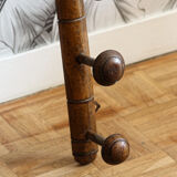 Wall mounted wooden coat rack turned