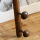 Wall mounted wooden coat rack turned