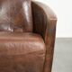 Cowhide armchair in Aviator design in a warm brown colour