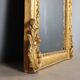 Antique eclectic style mirror in carved and gilded fir, Italy, 19th century.