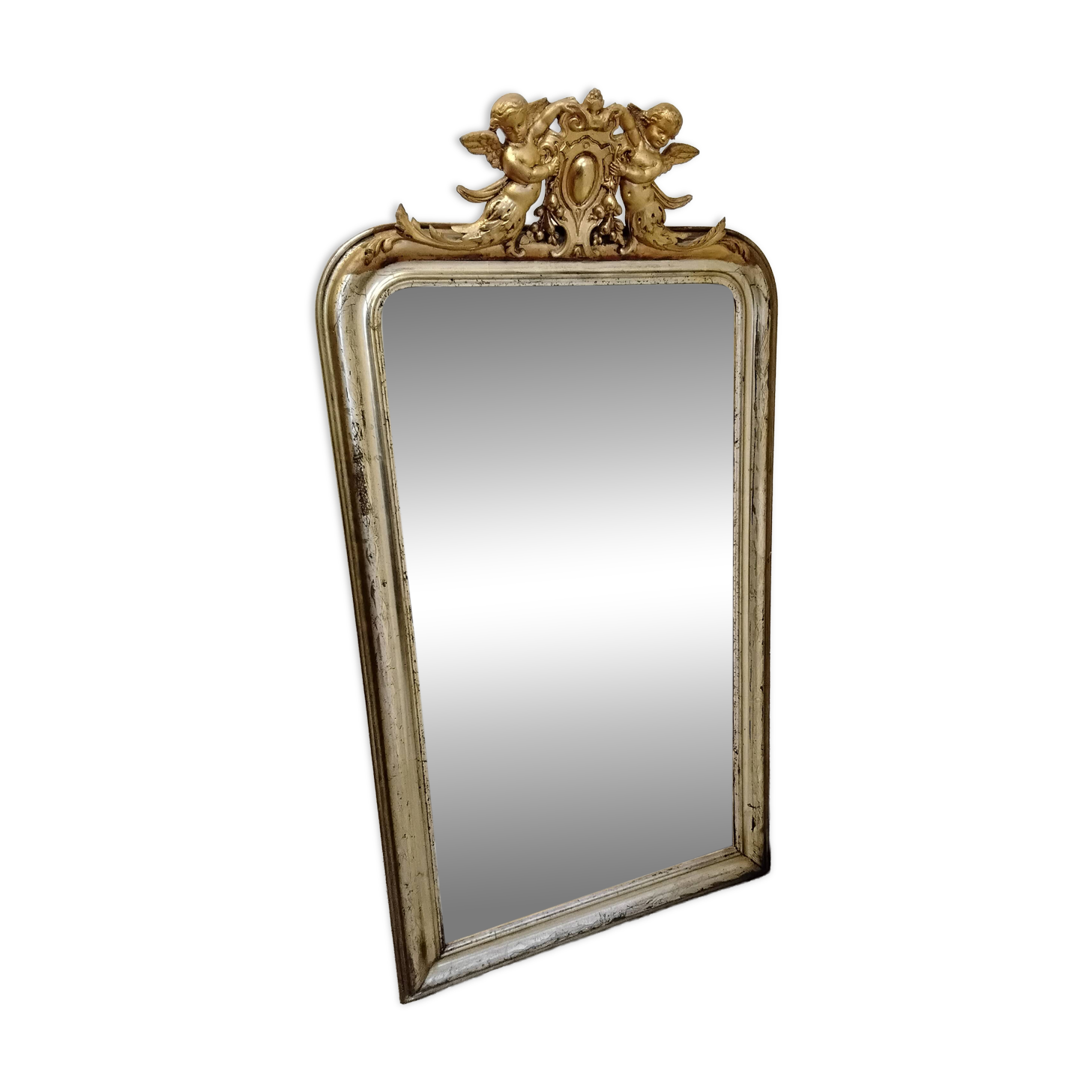 Antique mirror with a gilded frame and cherubs.
