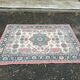 Vintage oriental rug in burgundy red, 133x196cm.