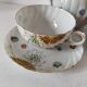 coffee pot, cup and saucers