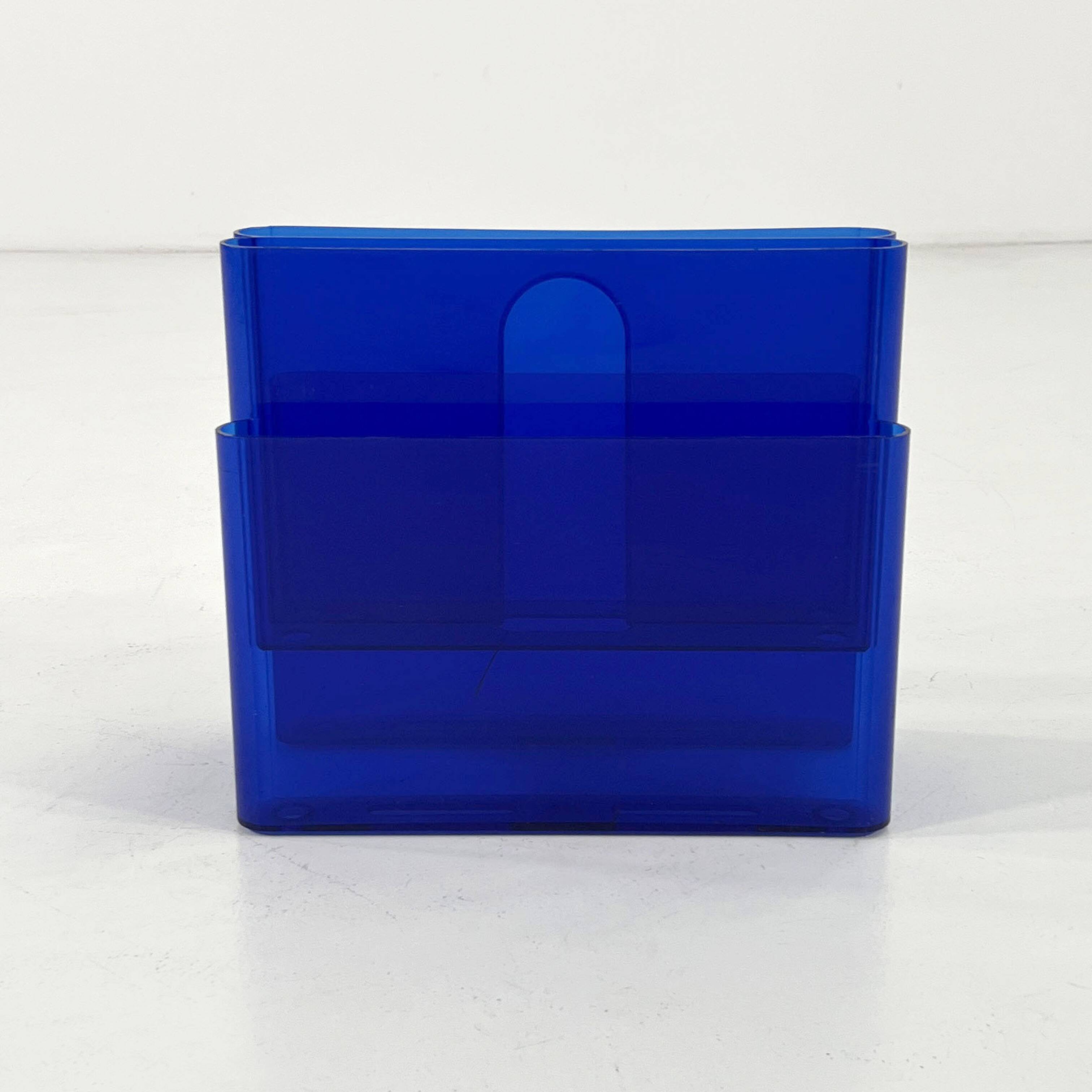 Blue transparent magazine rack by Giotto Stoppino for Kartell, 1970.