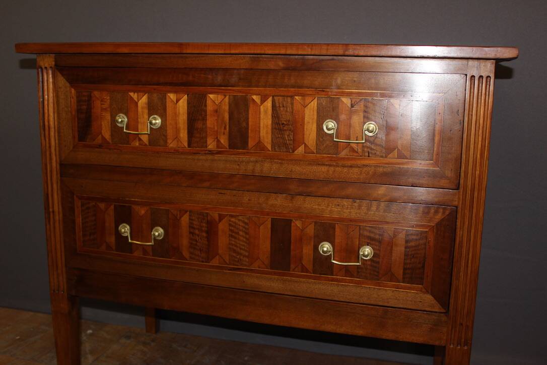 Louis XVI style chest of drawers in walnut and 19th century marquetry