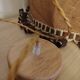 Large hanging pendant light with a burlap and pom-pom style