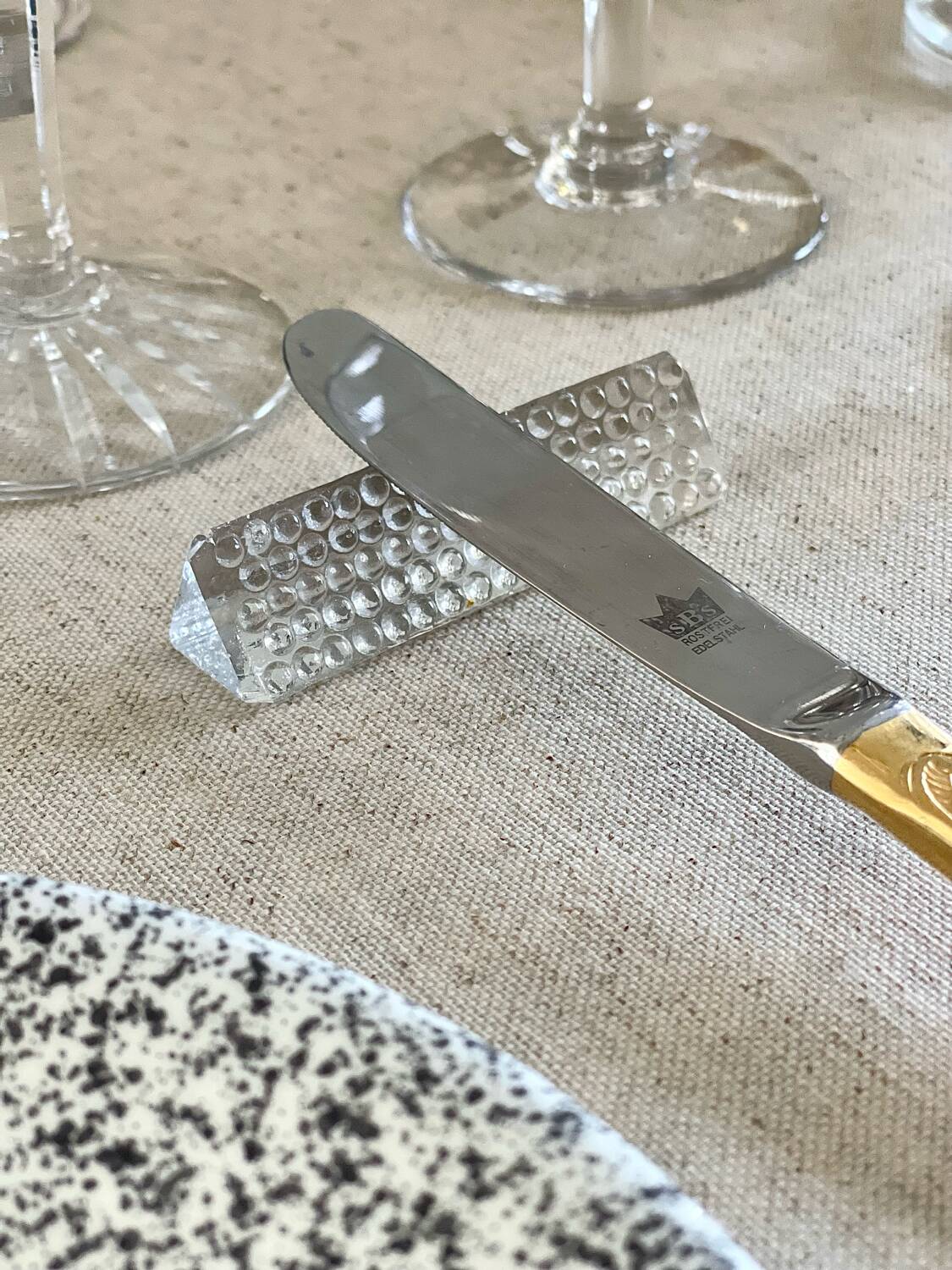 12 glass knife holders.