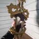 Italian mirror in gilded wood with gold leaf from the 18th century.