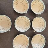 Set of polka dot porcelain cups and plates
