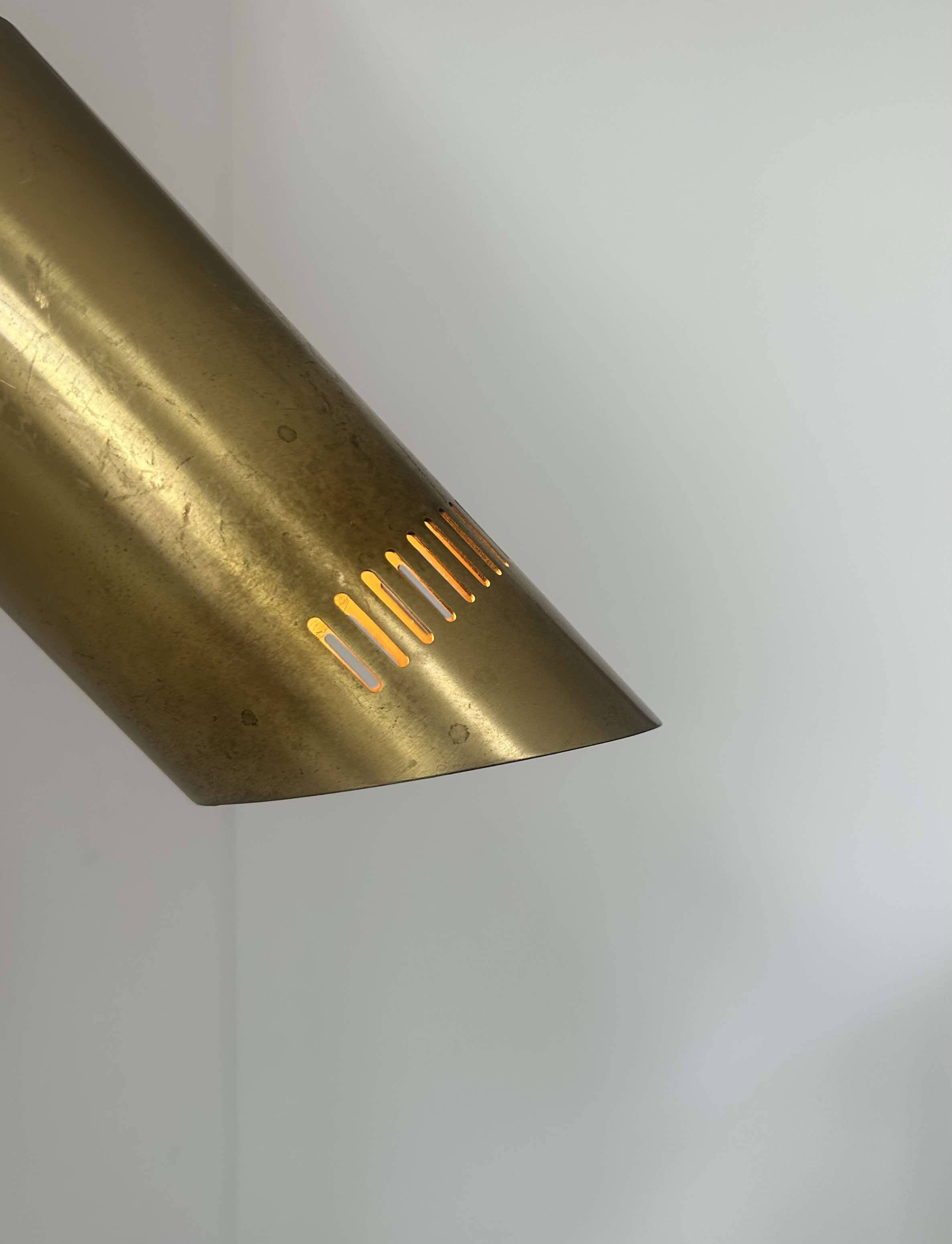 Vintage adjustable wall light, solid perforated brass, France 1960