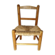Old child chair in wood and straw