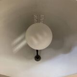 Black metal tripod floor lamp