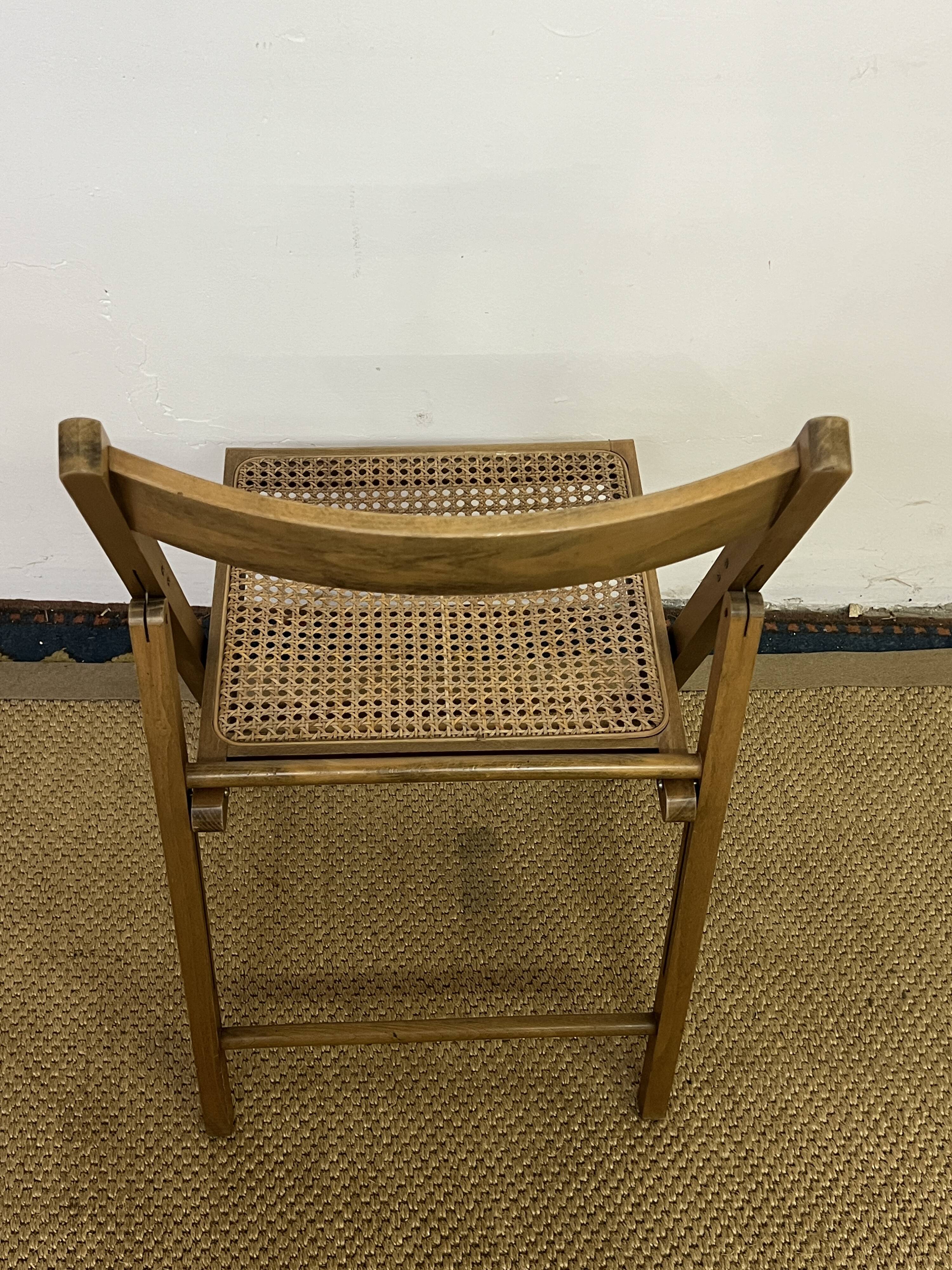 Vintage wooden and cane folding chair
