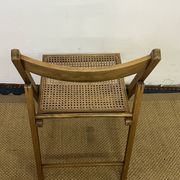 Vintage wooden and cane folding chair