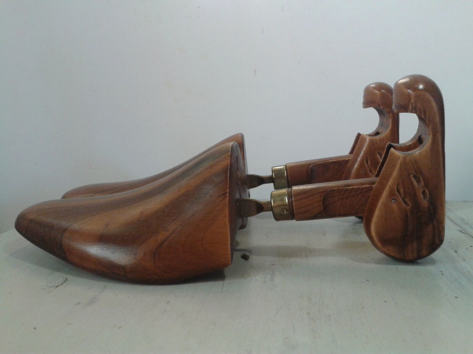 Pair wood and brass shoe