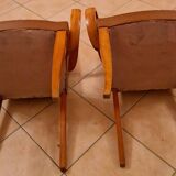 Pair of Art Deco armchairs in curved wood and brown leather – 1930s