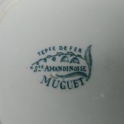 Set of three iron earthenware plates from the St Amandinoise earthenware factory, lily of the valley model.