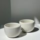 Trio of white ceramic cups D9cm