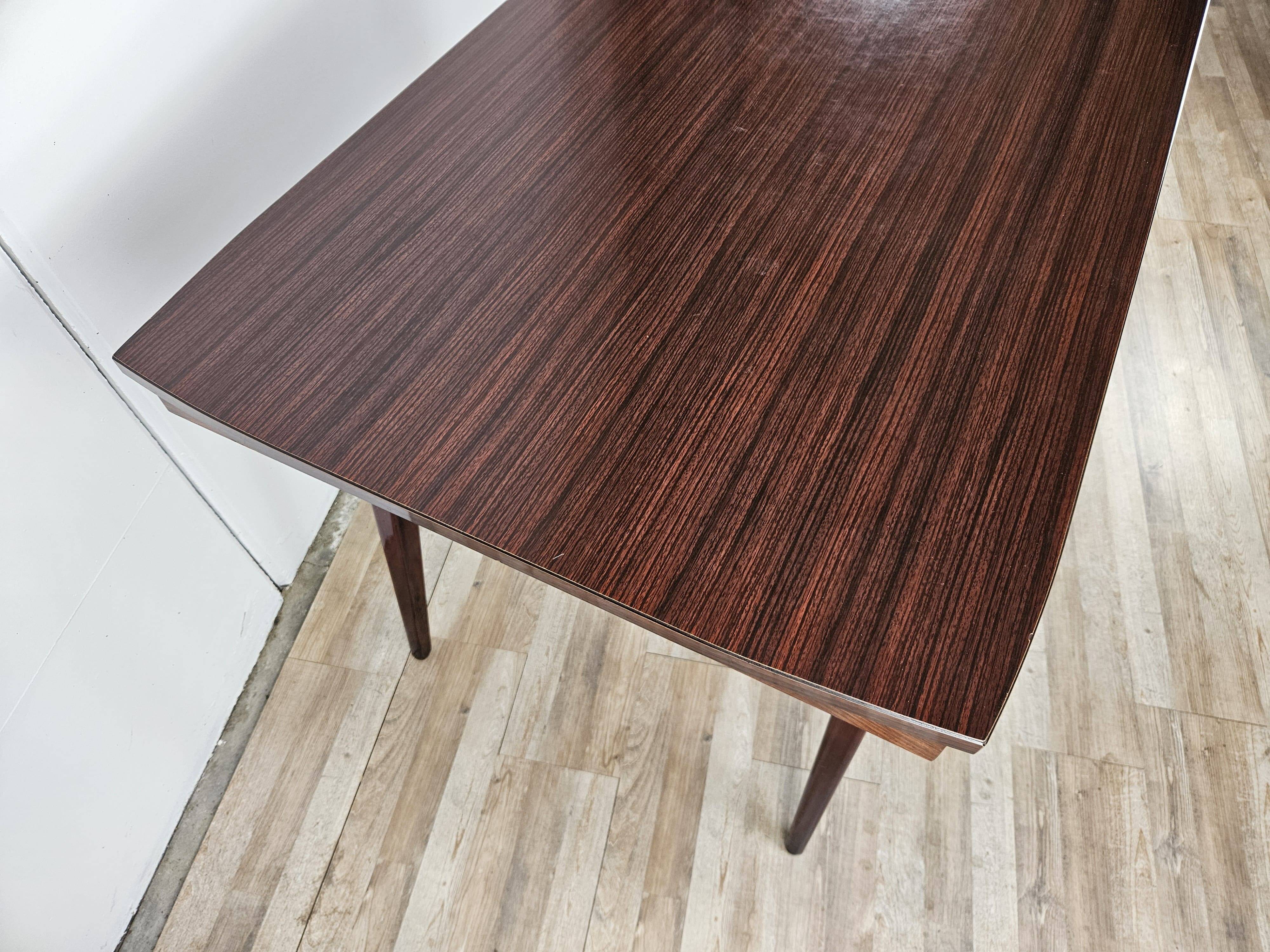 Mid Century table in rosewood laminate