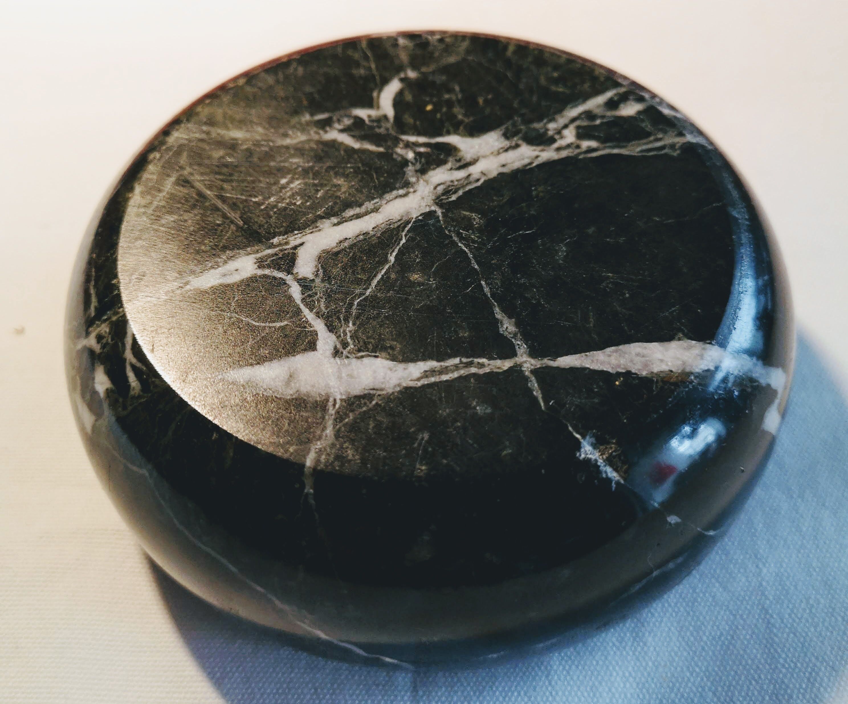 Paper press ball and marble ashtray