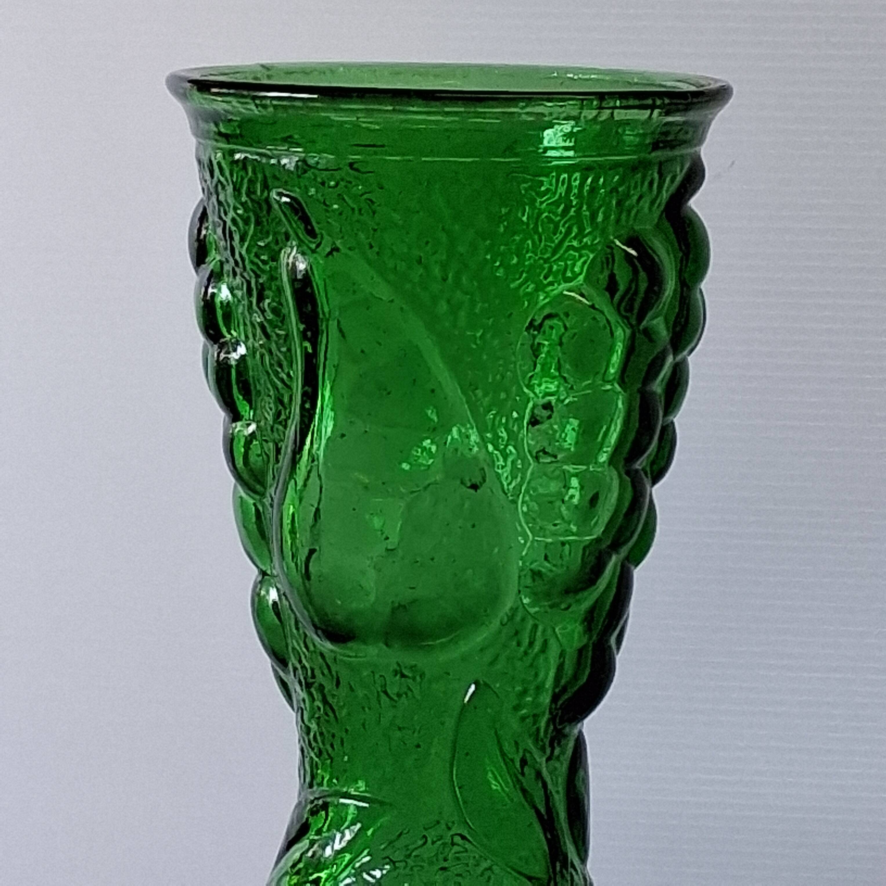 Vintage green glass vase with a fruit design in very good condition.