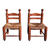 Pair of low armchairs by the fireplace. (Straw seat)