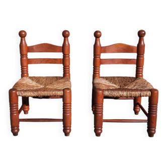 Pair of low armchairs by the fireplace. (Straw seat)